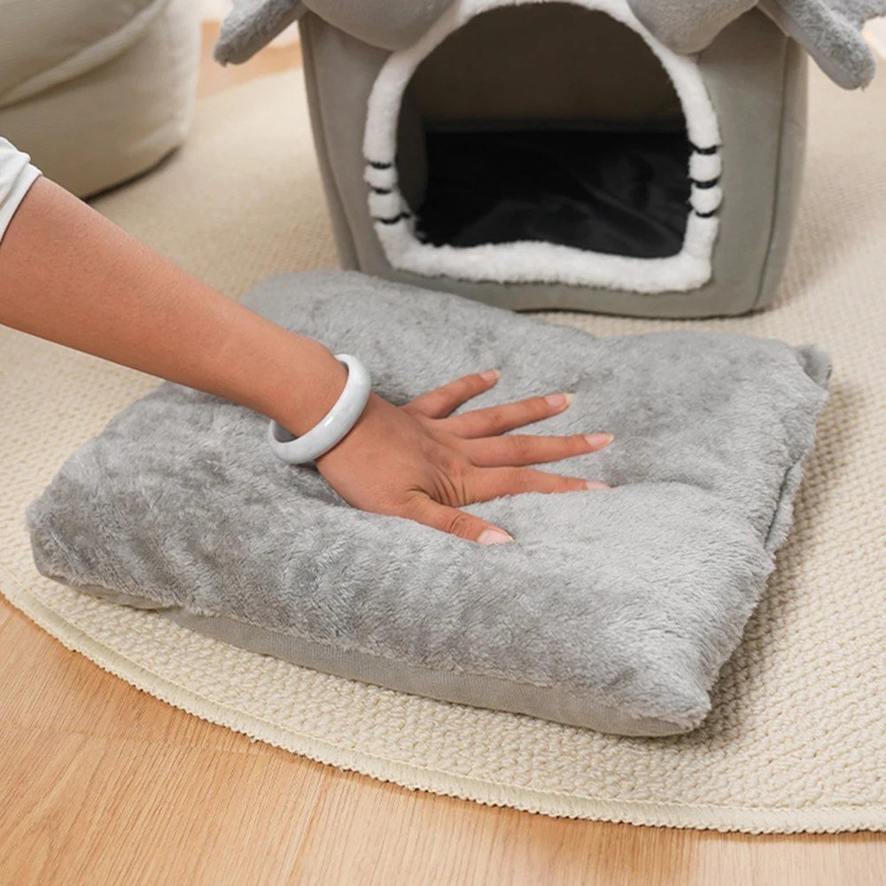 Removable plush cushion from the cat house