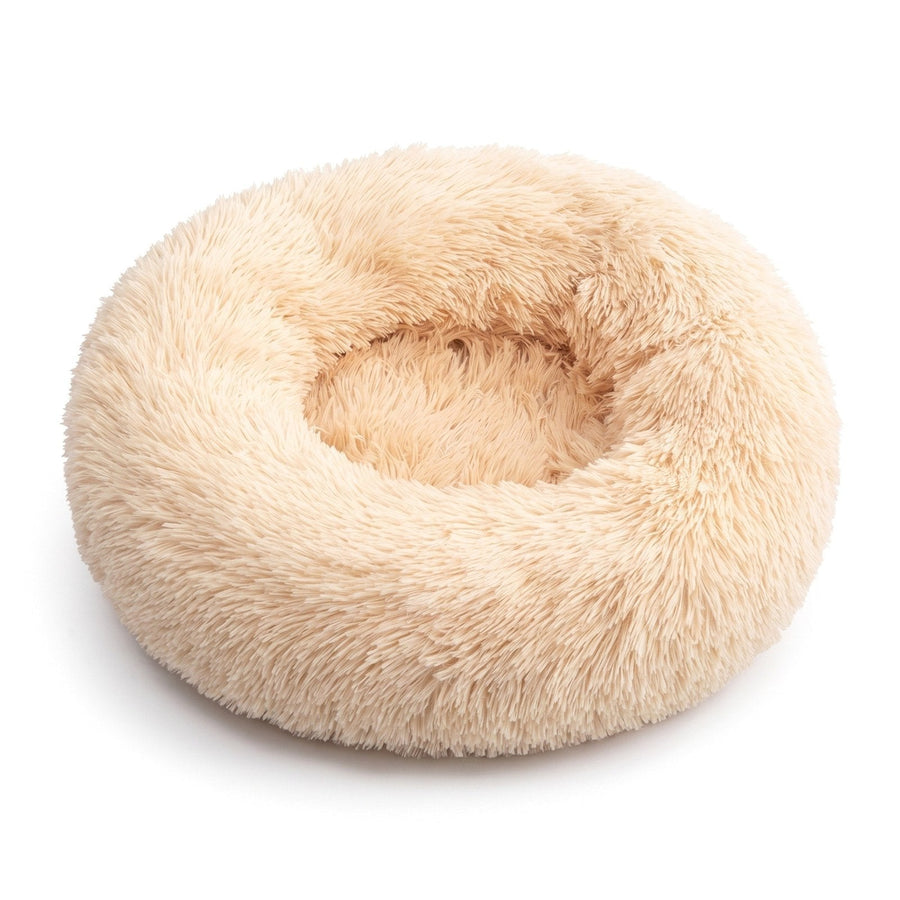 Fluffy round donut dog and cat bed in Honey on a white background