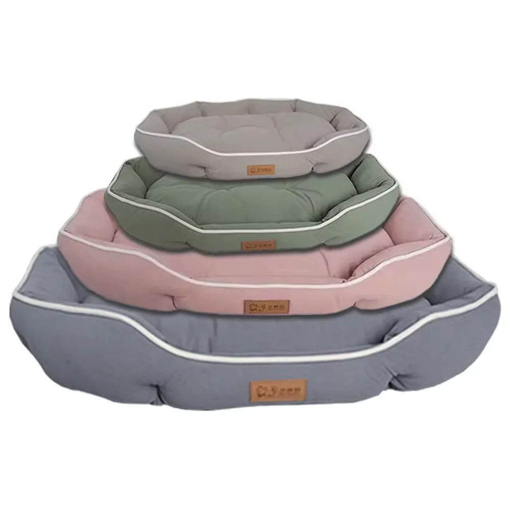 Bolster sofa dog beds stacked to show the four sizes